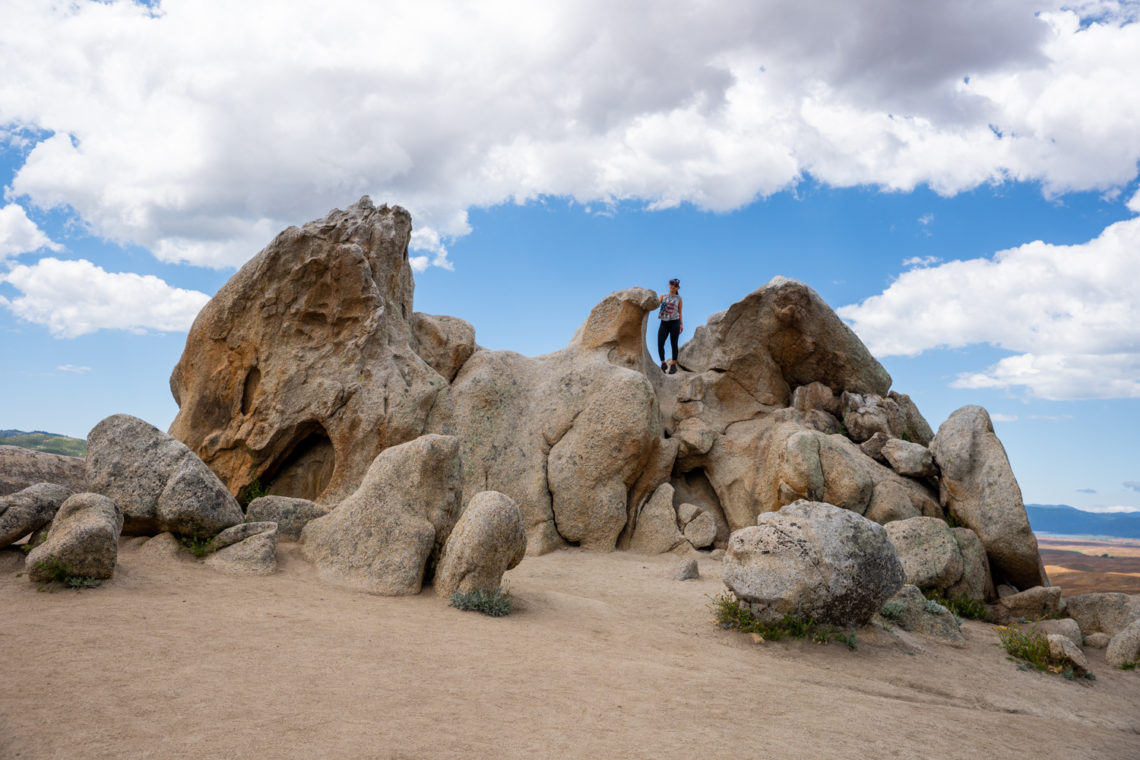 Girl standing on top of Eagle Rock