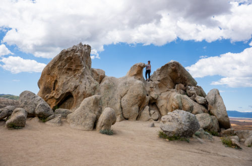 Girl standing on top of Eagle Rock