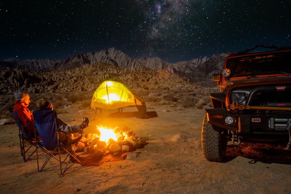 Dispersed camping under the milky way and fire pit